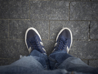 feet on the pavement