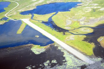 The runway of Djupivogur Airfield from the air