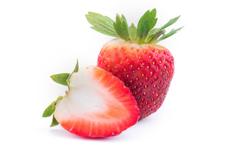 Strawberry with sliced half and leaves isolated on white background