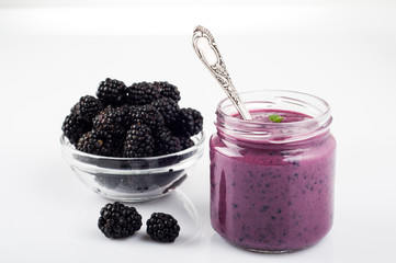 Blackberry yogurt smoothie in glass and fresh berries series