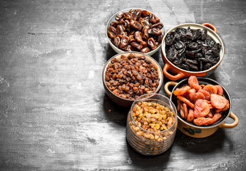 Dried fruits in bowls.