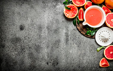 Freshly squeezed grapefruit juice with fruit pieces.