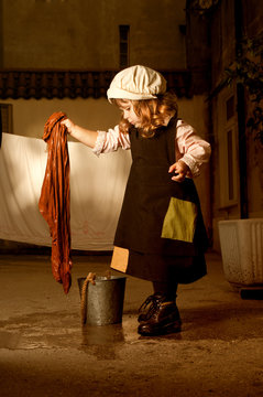 Portrait of a little caucasian girl in character of Cinderella