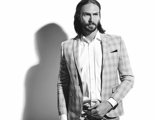 portrait of handsome fashion stylish hipster businessman model dressed in elegant light blue suit  isolated on white