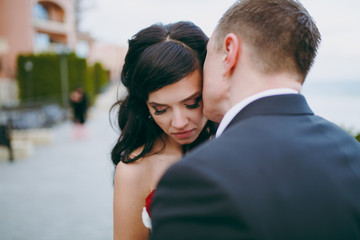 Beautiful bride and groom couple walking at the wedding