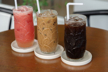 black and milk coffee with tomato juice