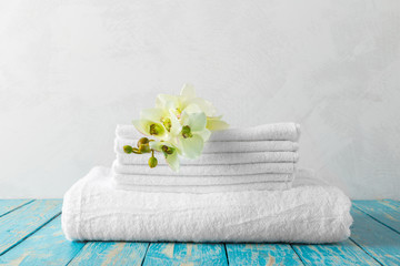 Fototapeta na wymiar towels with orchid flower