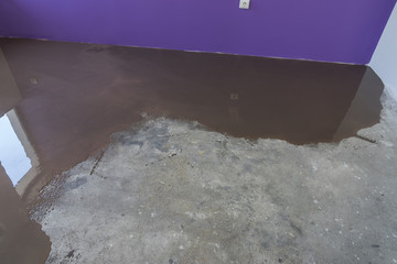 Interior of house under construction. Mirror smooth surface of t