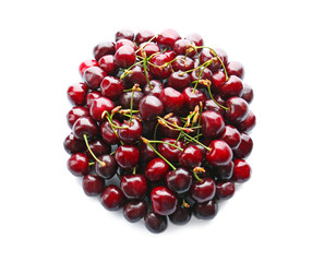 Heap of ripe cherries on white background