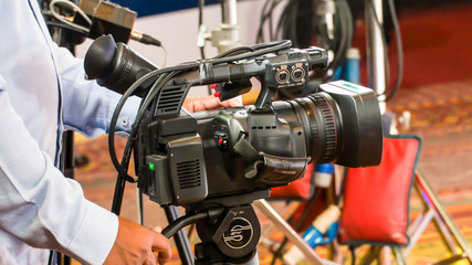 Filming television shows have camcorders in the studio.