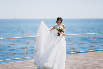 Fototapeta na wymiar Portrait of a beautiful bride on wedding day