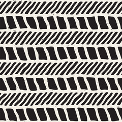 Seamless pattern with hand drawn brush strokes. Ink doodle illustration. Geometric monochrome vector pattern.