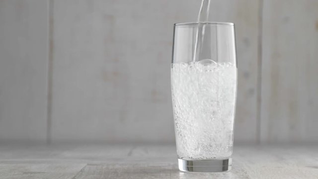 sparkling water poured into a glass