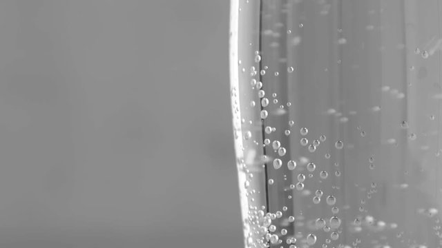 closeup of sparkling water bubbles in a glass