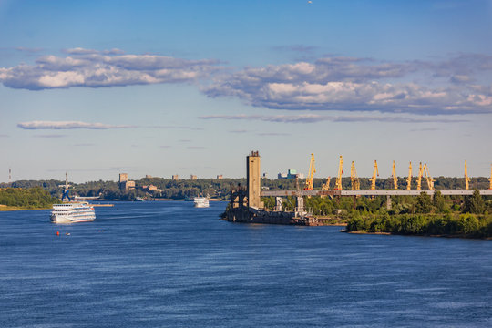 The Volga river passenger ships and cranes