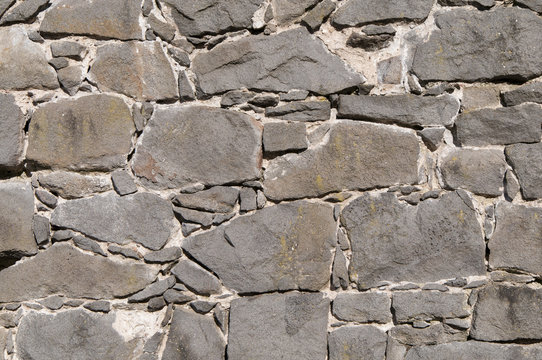 Wall masoned of basaltic rock