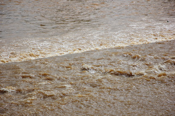 Brown colour of Ping River in Saraphi Dam