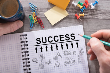 Success concept on a notepad