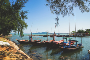 Thai small fishing boats have docked at fishing  village at day time