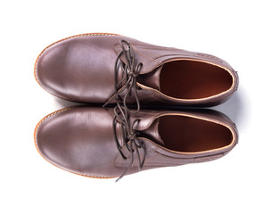 Brown leather men's shoes isolated on white background