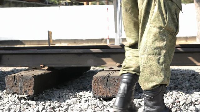 Military trolley on railway.