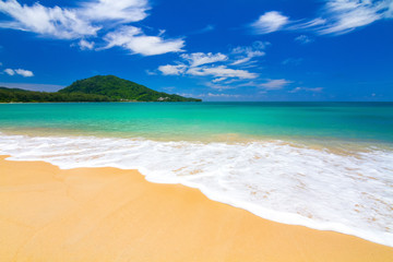 Fototapeta na wymiar Tropical beach, Great blue sky and calm Andaman sea on Nai Yang beach in Phuket Thailand