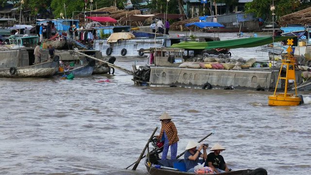 Can Tho city, Viet Nam - 03 May, 2017: Unidentified people on floating market in Mekong river delta. Cai Rang and Cai Be markets are very popular among the local citizens and tourists