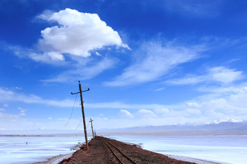 Railway tracks cross over salt lake