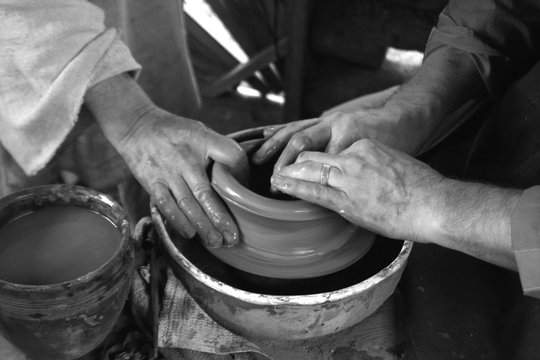 Potter And His Traynee Hands In Black And White