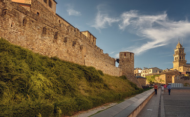 Fototapeta na wymiar Defensive walls of medieval castle in Ponferrada and San Andres church, Spain