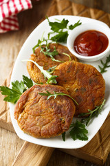Vegetarian burgers with arugula and tomato sauce