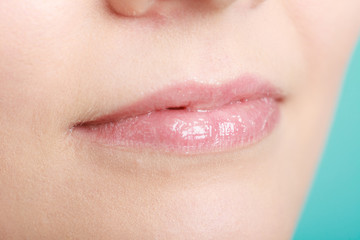 Obraz premium Closeup glossy female lips. Part of face.