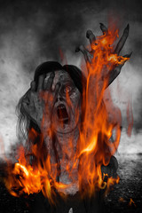 3d illustration of scary ghost woman screaming with fire burning on her body,Horror background,mixed media
