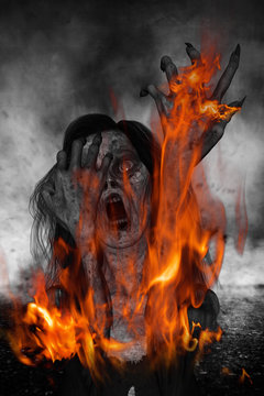 3d illustration of scary ghost woman screaming with fire burning on her body,Horror background,mixed media