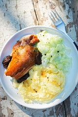 Roasted turkey breast with mashed potatoes and cucumber salad
