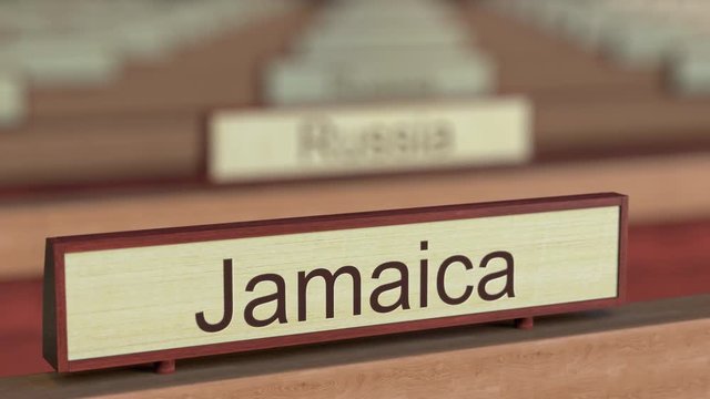 Jamaica name sign among different countries plaques at international organization. 3D rendering