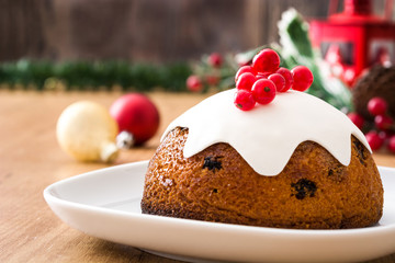 Christmas pudding on wooden table
