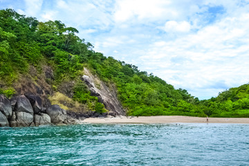 Naklejka premium Rocks, Trees and Sea Green Waters of South Goa, India