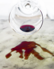Disaster, marks of red vine on a marble table