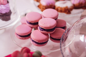 Pink macaroons with violet cream