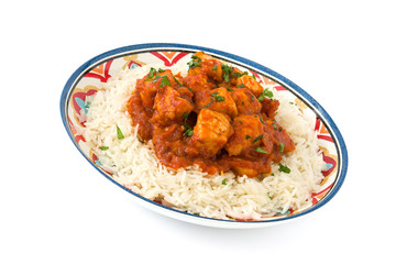 Chicken tikka masala with basmati rice isolated on white background
