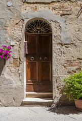 Fototapeta na wymiar Traditional Italian village, a door in an old house