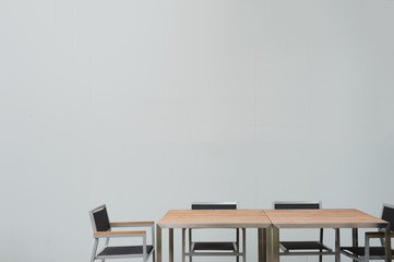 Conference room with place for drawing on wall. Closeup of modern office. White poster on wall.  