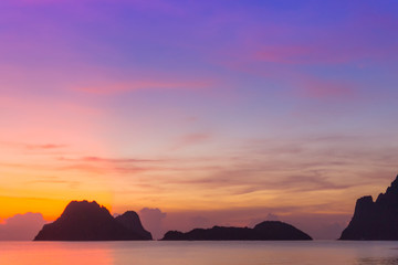 Naklejka na ściany i meble Morning sunrise on the east coast of Thailand is the day where the sky looks bright and colorful.