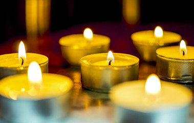 Tea candle, burning, solemn