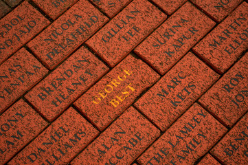 red brick with George bests name in front of old trafford stadium