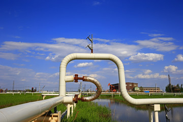 Fototapeta na wymiar Oil pipes and valves