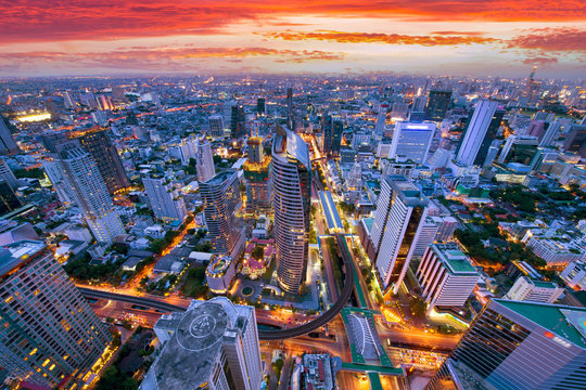 Bangkok business district aerial view skyline with sunset time.