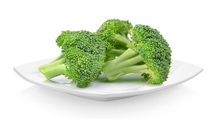 Broccoli in white plate on white background