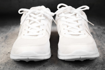 Pair of white sports shoes